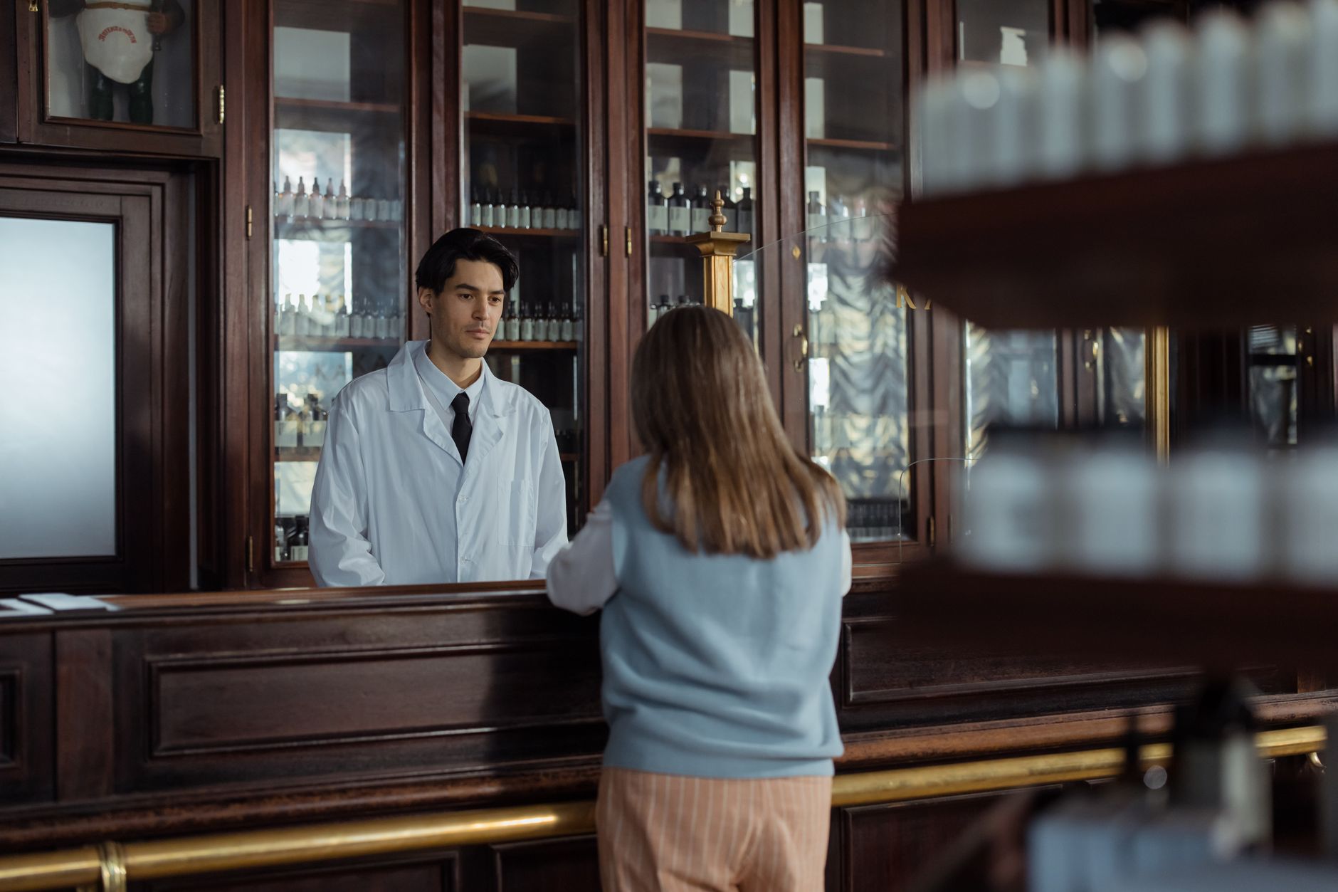 Clinician discussing a medication and hormone therapy plan with a patient